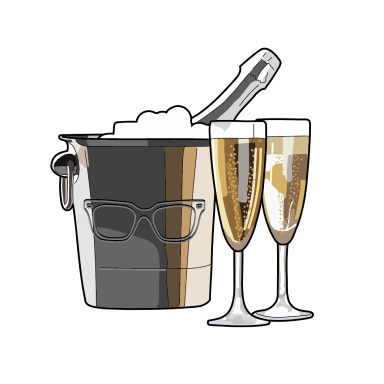 Champagne bottle in a metal bucket next to two champagne flutes